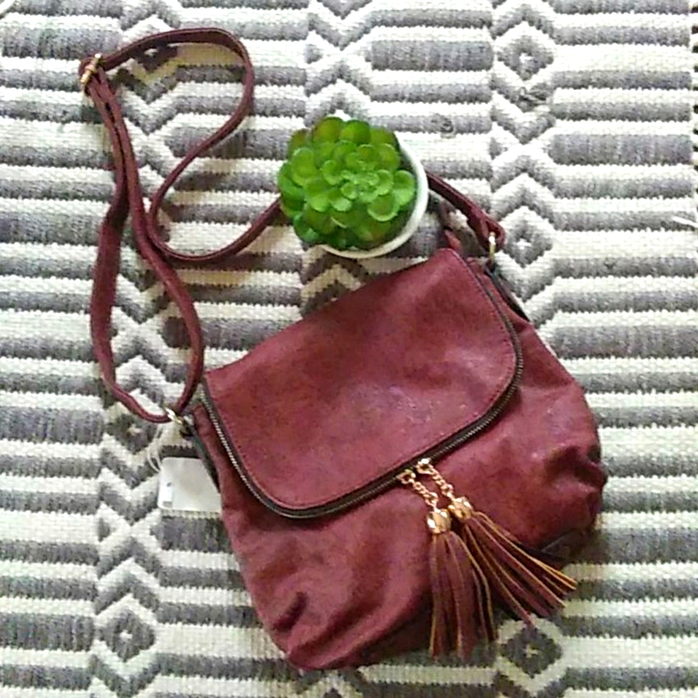 Adorable burgandy colored crossbody purse